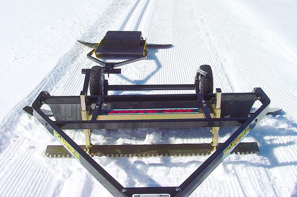 using multiple snow groomers