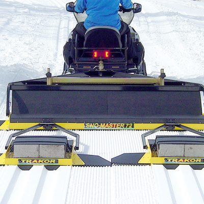 SM72H w/SNO-RAZOR & 2 TRAKOR Standards w/12” Wing Sets side by side ski tracks laid for racing courses or just enjoying the snow.