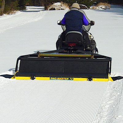 SNO-MASTER 72 w/SNO-RAZOR Notice how the wings keep the snow from falling into the groomed area.