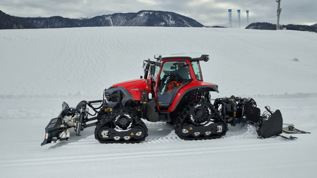 Snow Grooming Tractor with Tracks and Snow Plow