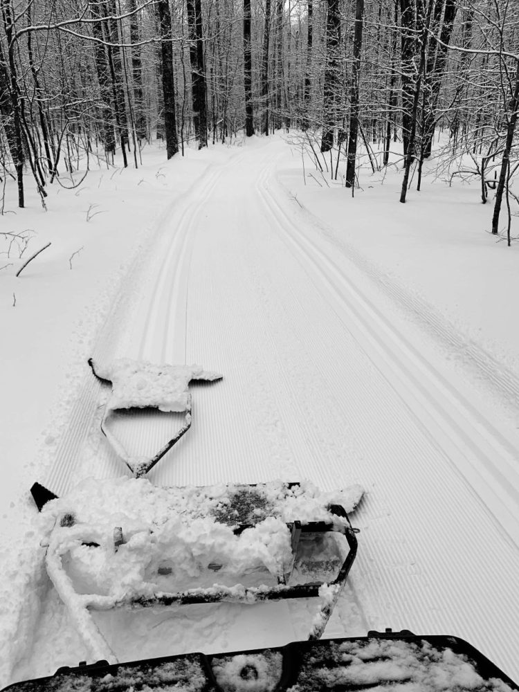 snow groomer classic and skate ski path.